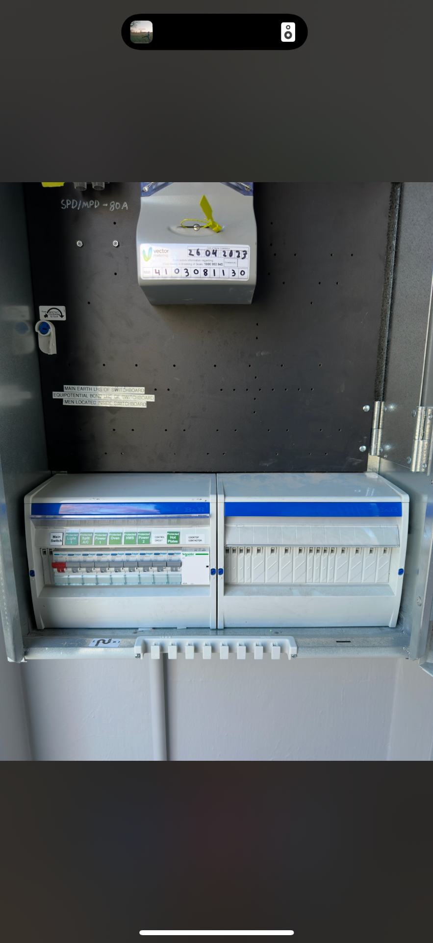 Modern residential switchboard with circuit breakers and safety switches